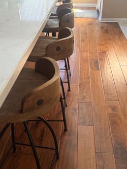 Rustic wood and iron swivel stools, 4