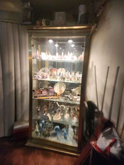 Glass and gold color curio