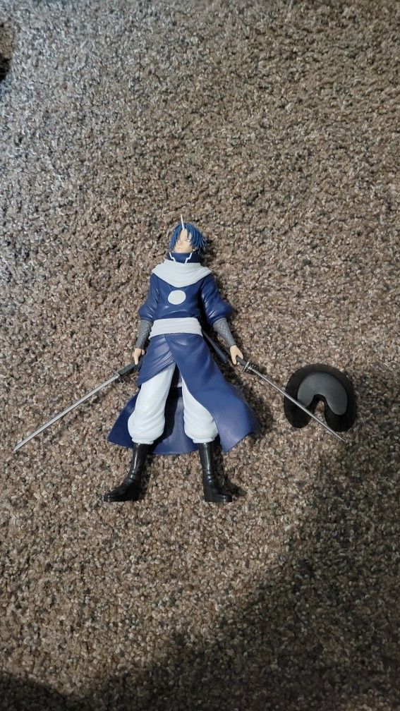 Figures, Stuffed Animals And A Cup