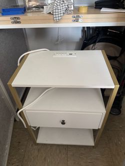 White side table with outlets