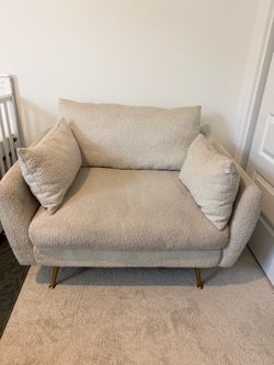 Large boucle arm chair
