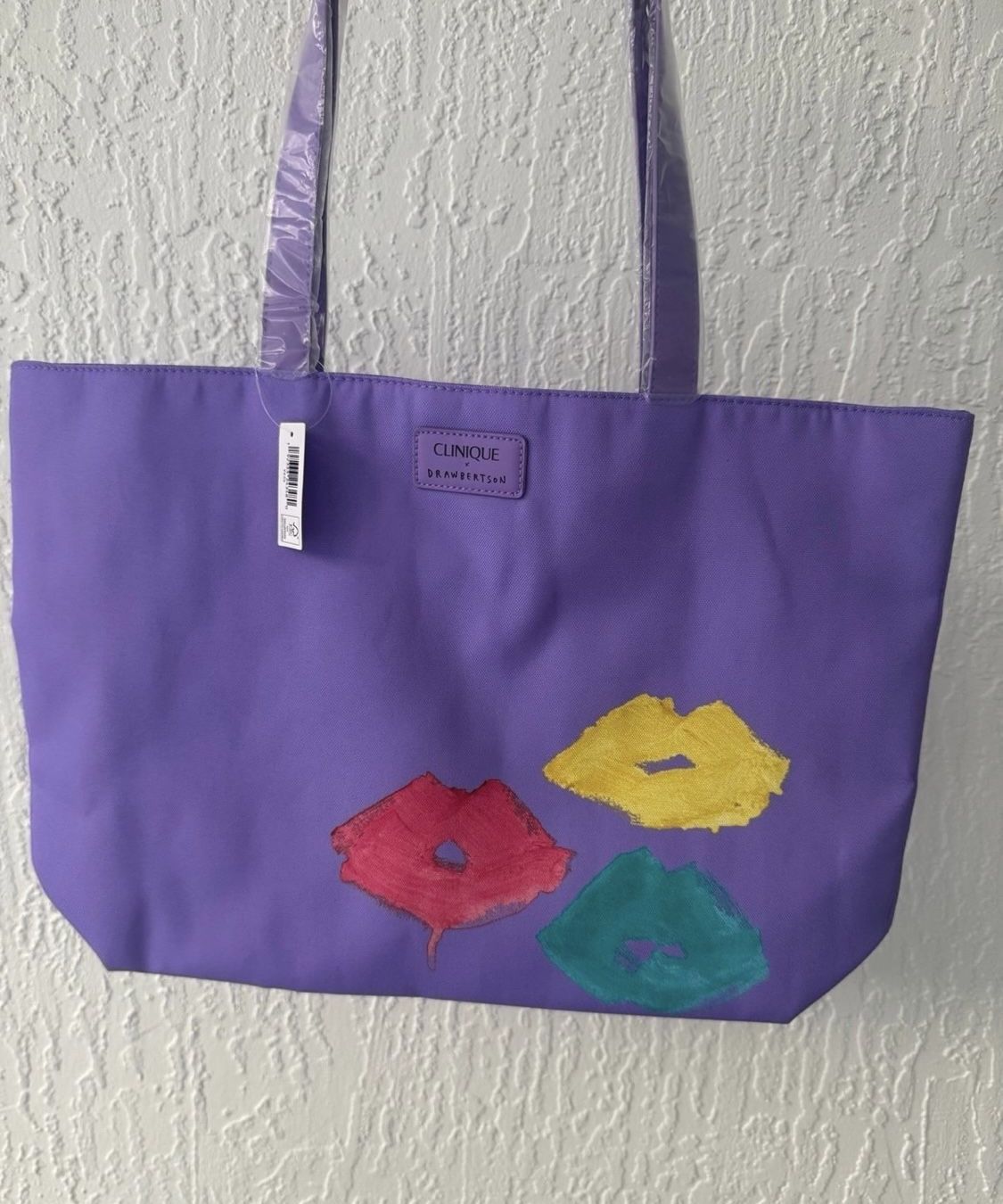 Clinique beauty tote cotton blend bag purple lips design  Brand new