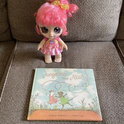 Doll with hardback book