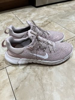 Woman’s Nike Free 5.0 size 9.5 pink