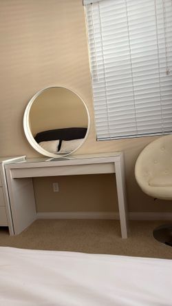 Ikea mirror and table with chair and lamp