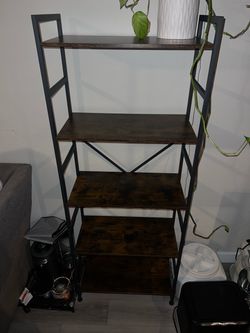 Metal frame bookshelf with wooden shelves