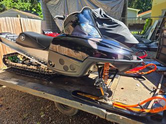 2 Arctic cat snowmobiles for sale