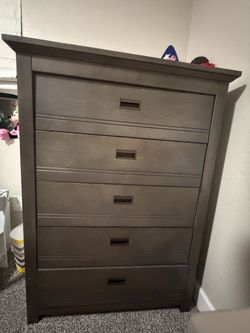 Living spaces  grey dresser and desk