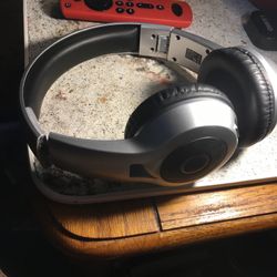 silver bluetooth headphones