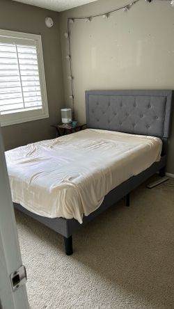 Dark grey full size bed frame (no mattress)