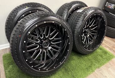 NEW 22x12 gloss black/milled wheels and atturo 285/45r22 tires