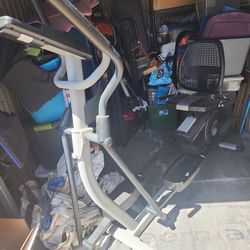 Elliptical/ stationary bike combo and an inversion table