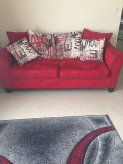 Red with gray linen couches