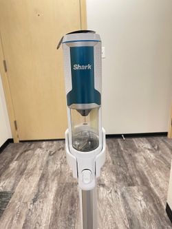 Shark brand vacuum cleaner, $200, purchased six months ago and used three times. Discount available