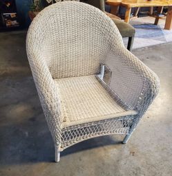 white wicker armchair