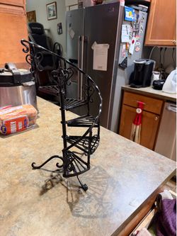 Tiny rod iron plant stand