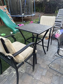 Small high table and 2 chairs