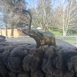 Brass elephant trunk up