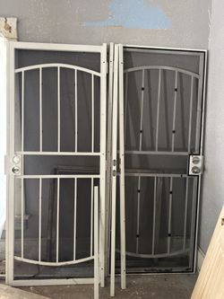 Two 32 x 80 Security Doors White Good Condition