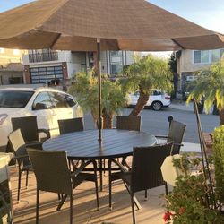 10 Piece Patio Set! Large 59” Outdoor Metal Table, 8 Arm Chairs and Huge Patio Umbrella