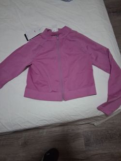 Brand New tags on Nike jacket