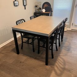 Crate And Barrel Parsons concrete and steel dining table