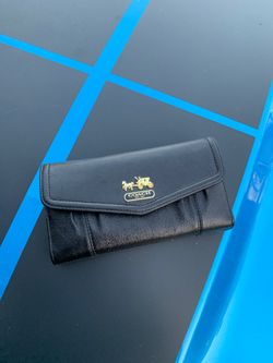 Authentic Coach wallet.