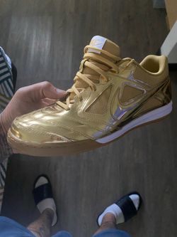 Gold Nikes size 13 men’s