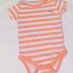  3-6 months puma white onesie with orange stripes used