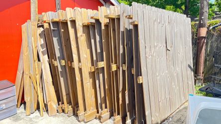23 ) wood fence 8 feet long