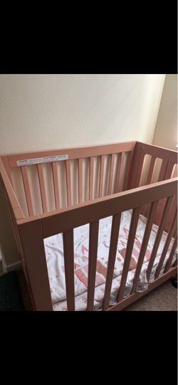 Pink baby crib