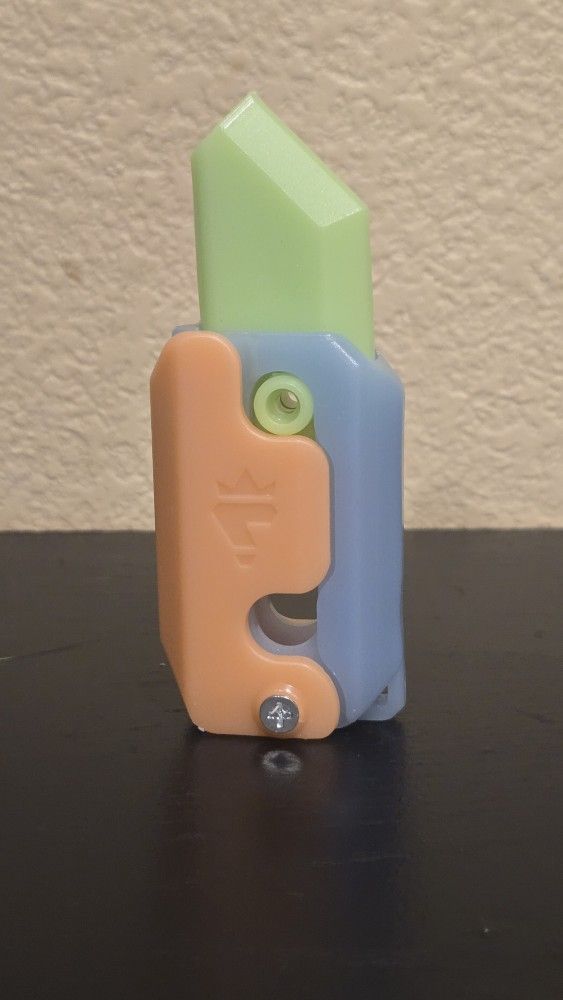 3D Printed Fidget Carrot Knife Toy Pink Blue and Green