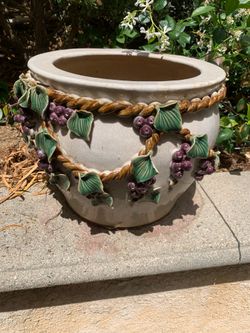 Large flower pot with exterior grape design