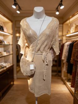 Lightweight netted dress with string tie around the waist