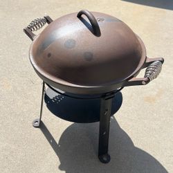 Barebones All-In-One Cast Iron Grill is a portable 6-piece modular outdoor cooking