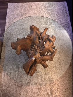 Driftwood coffee table with round glass