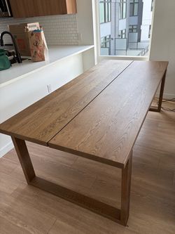 Large modern wooden dining table