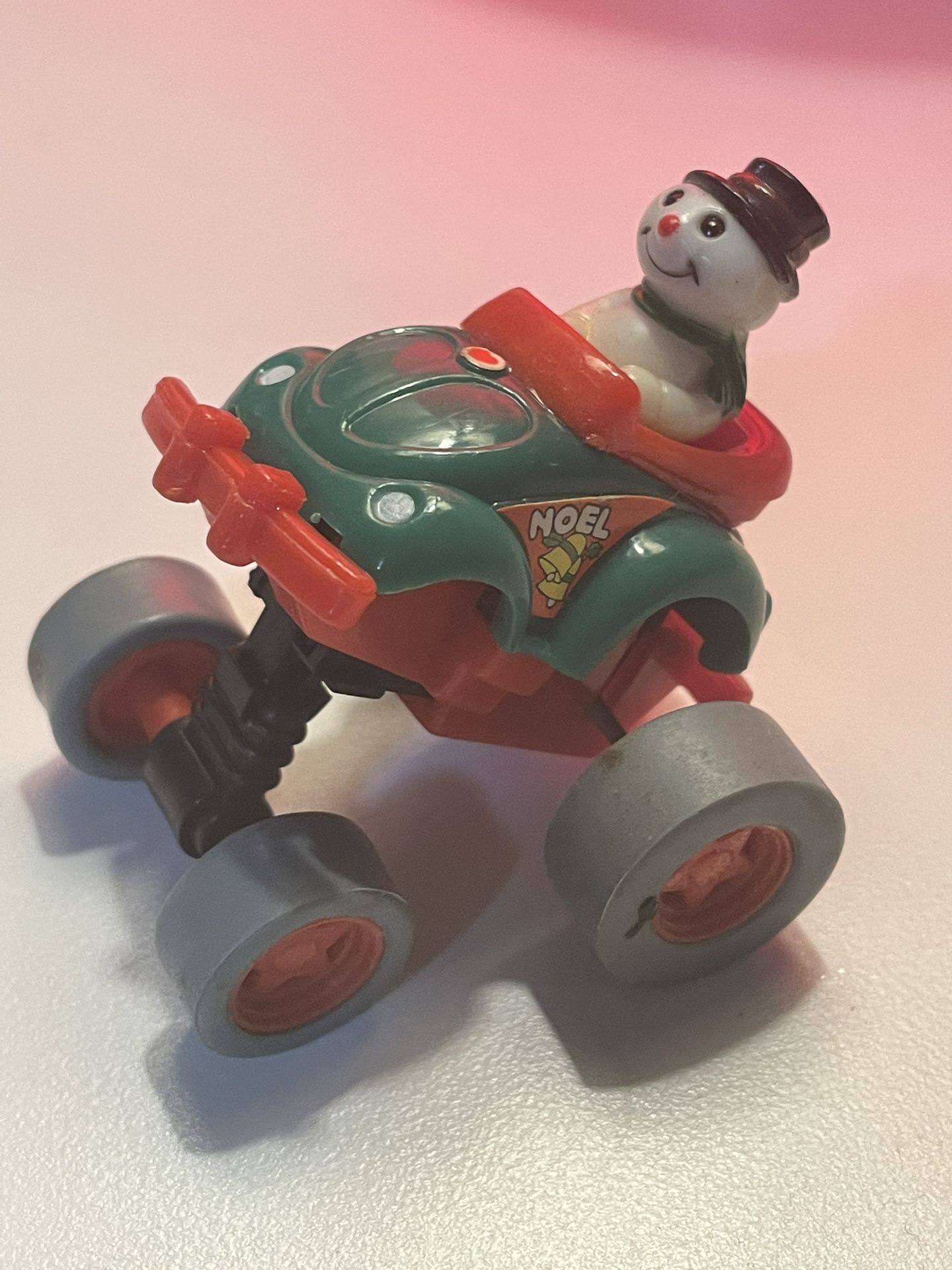 Vintage snowman In VW Beetle Push Car. Works great!