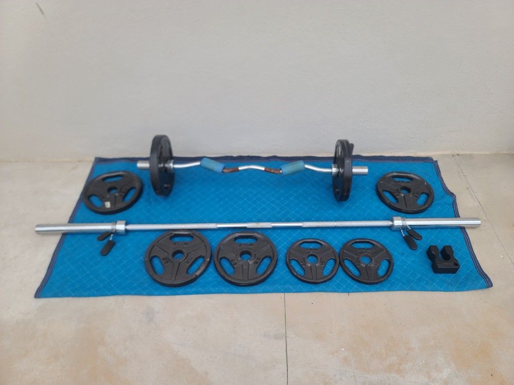 (2) Weight Bars + 140 Lbs. of TSA Weights. Selling Cheap.