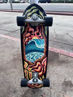 CARVER PSYCHEDELIC SUNSET CX COMPLETE 9.875″ X 32″ BLACK $329 retail Jake Wood of Snake Craft is a surfer and artist from Sa