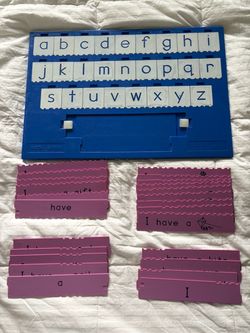 Instalearn board with letters and practice strip.