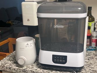 Sterilizer/dryer and bottle warmer