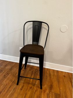 black metal and wood barstools