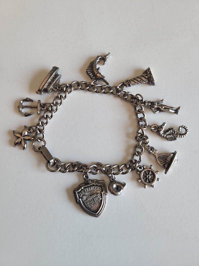 Vintage San Francisco Silver Tone 7" Charm Bracelet 11 Charms Toggle Clasp