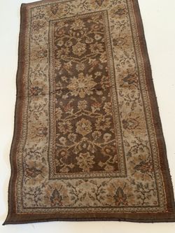 Brown Rug Which Coordinated With Larger Rug Posted!44”x24”
