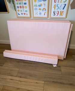 Pink foldable gymnastics mat and beam
