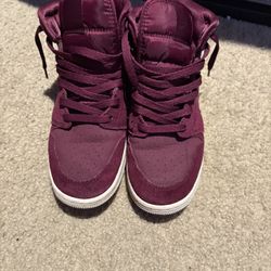 Burgundy Jordan 1 Mids