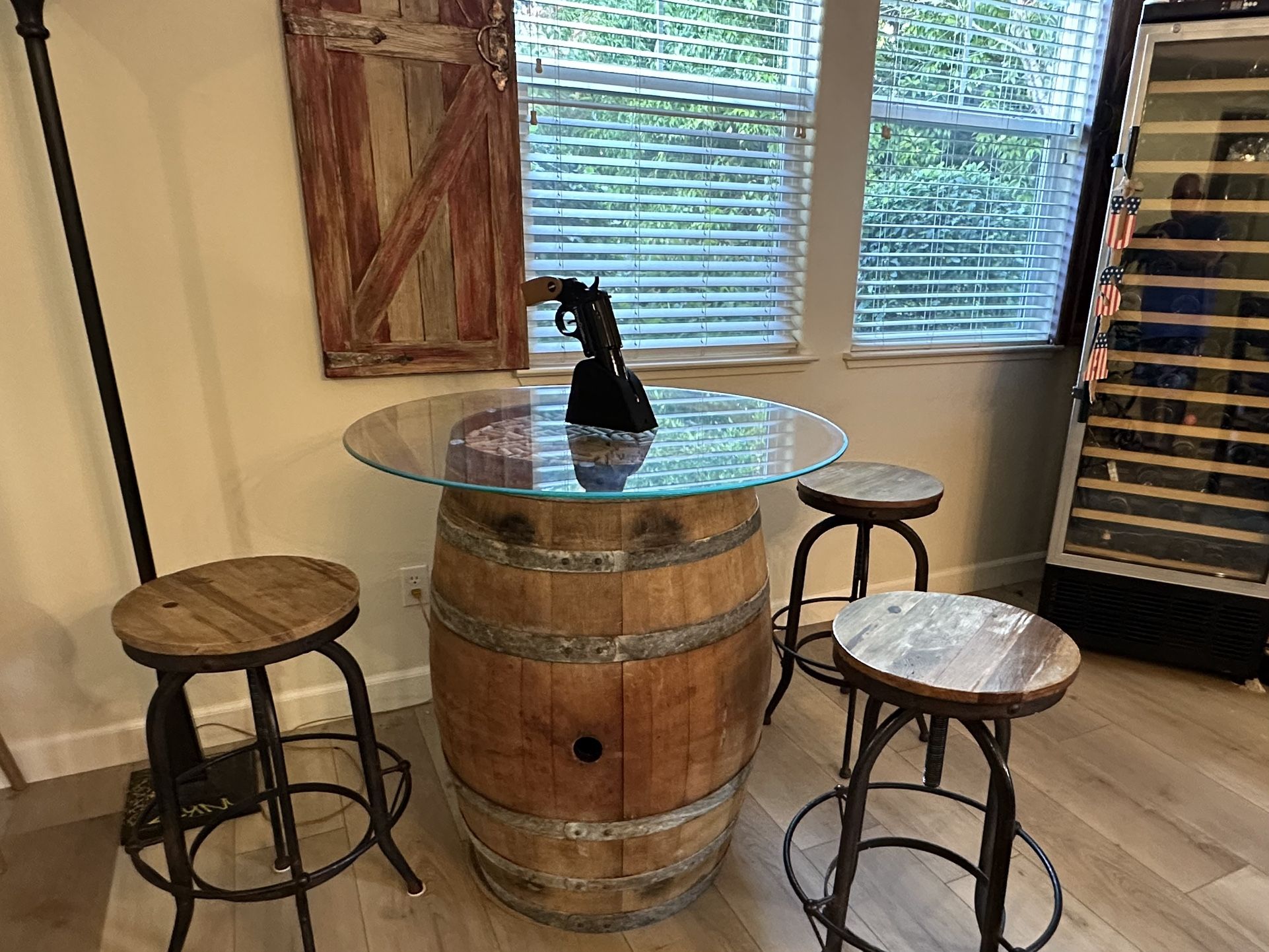 Wine Barrel Table 36in. tempered glass top 3 stools $300