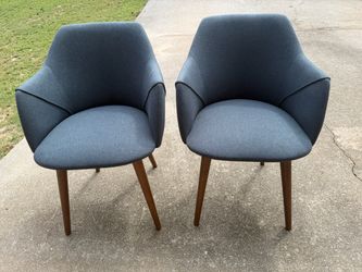 Two upholstered arm chairs or dining chairs