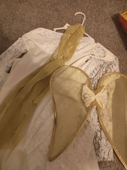 angel with wings and belt costume
